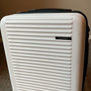 Calpak 21 inch Hard Side Carry On Spinner